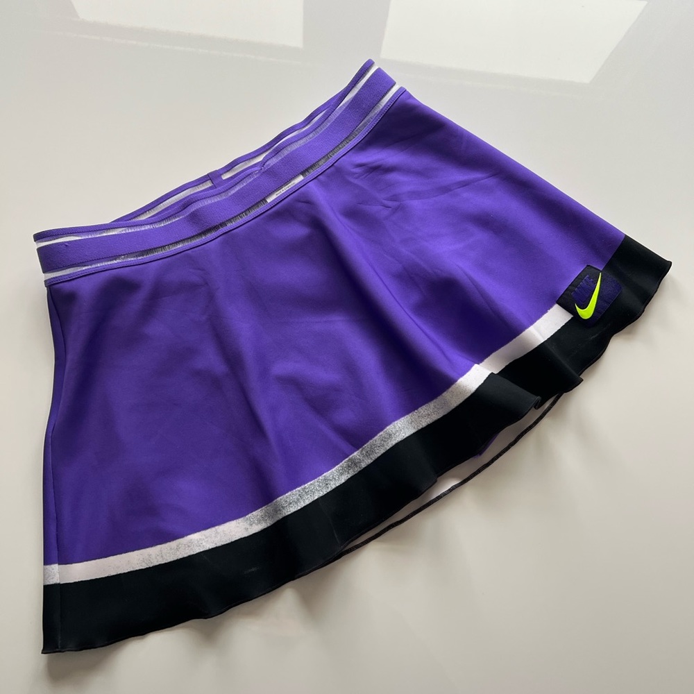 Nike Purple Tennis Skirt with built in shorts Size medium . Gently worn Dri-fit
